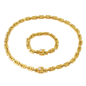 Gold-plated chunky chain necklace and bracelet set with gemstone toggle clasps