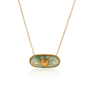 Close-up of golden oval shell necklace with blue crushed shell inlay and starfish motif