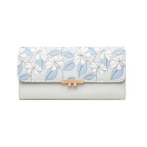 Detail of light blue long wallet showing floral prints and gold metal hardware logo