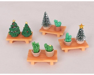 Miniature Christmas tree and cactus figurines on wooden bases for DIY table decor