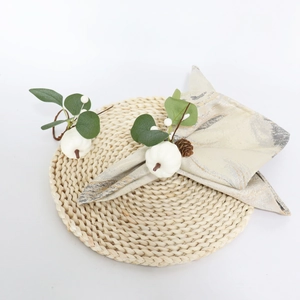 White pumpkin and eucalyptus leaf napkin rings for Thanksgiving table decor