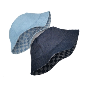 Denim bucket hats in light and dark blue with reversible checkerboard lining for women