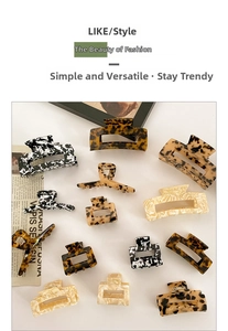 Flat lay of diverse acetate hair claws in tortoiseshell and marble patterns