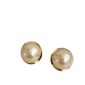 Elegant champagne large pearl stud earrings with gold metal base on white background