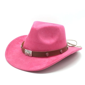 Detail of rose pink faux suede cowboy hat with vintage silver engraved metal buckle