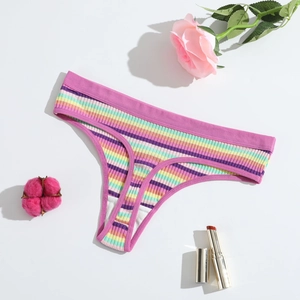 Detail of colorful striped cotton thong with ribbed texture and purple elastic waistband