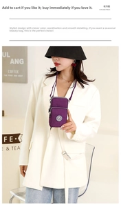 Detail view of purple nylon crossbody phone bag with multi-layer zippers and logo
