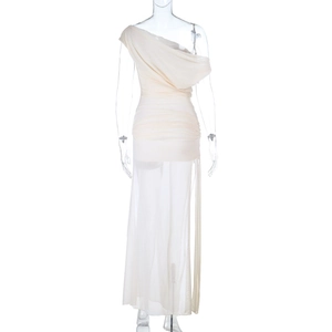 Detail of elegant cream one-shoulder dress with ruched bodice and sheer tulle fabric