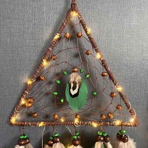 Handmade brown triangular dreamcatcher with LED lights and natural green feathers decoration