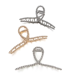 Minimalist metallic shark hair claw clips in gold and silver finish for women hair styling