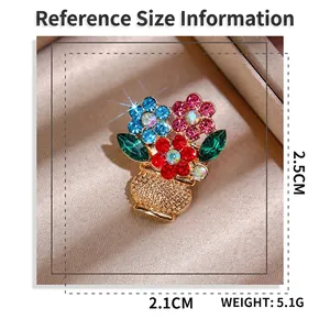 Exquisite gold flower basket brooch with colorful rhinestones on a satin background