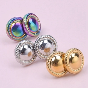 Close-up of geometric 304 stainless steel earrings in gold, silver and iridescent finish