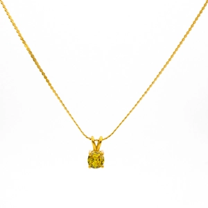 Close-up of gold-plated birthstone necklace with a vibrant round peridot green gemstone