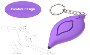 Purple leaf-shaped personal alarm keychain with matte finish and LED light button