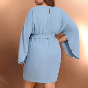 Detail of light blue short dress showing flare sleeves and matching waist belt from behind