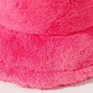 Detailed close-up showing the soft texture of the thick fuzzy pink faux fur material