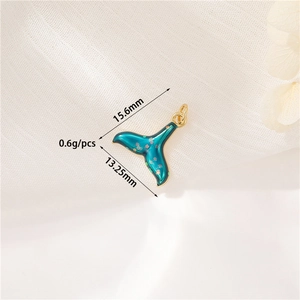 Detail of blue fish tail pendant with dimensions 15.6x13.25mm and 0.6g weight