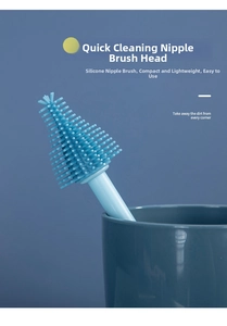 Close-up of conical silicone pacifier brush with flexible bristles in a cup