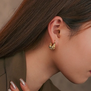Elegant gold braided hoop earrings for women featuring vintage woven texture design