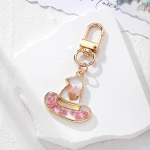 Pink dried flower hat pendant keychain with golden alloy frame and spring clasp