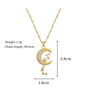 Detailed view of gold moon and star pendant with dimensions 1.8cm by 3.8cm