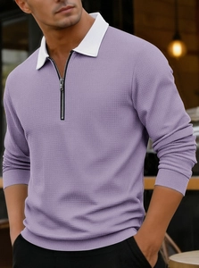 Detail of men's purple waffle knit polo shirt featuring white collar and zipper placket