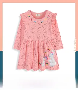 Detailed embroidery of gray rabbits and flowers on the pink cotton girl's dress