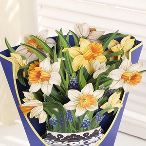 Detailed 3D pop-up card featuring daffodils and hyacinths in a blue floral patterned vase