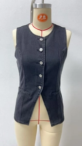 Detail shot of the vintage dark grey denim vest with metal buttons and V-shaped hemline