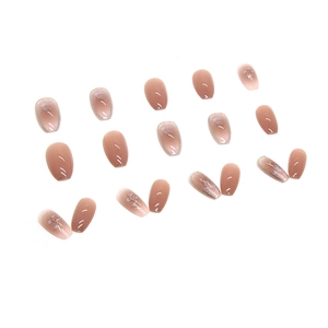 Pink cat-eye gradient press-on nails in medium coffin shape with shimmer powder finish
