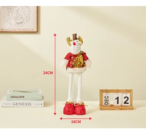 Detail of Christmas reindeer plush with sequins and telescopic legs in a home setting