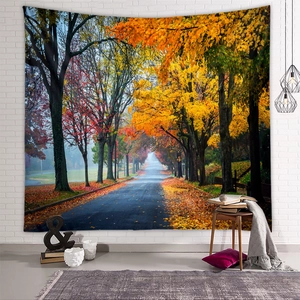 Close-up of autumn forest landscape tapestry hanging on a minimalist white brick wall