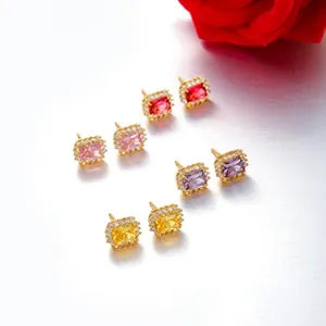 Detail view of rectangular halo stud earrings in four colors with gold plating