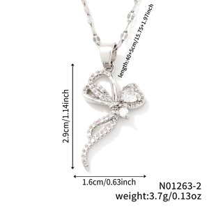 Detail of silver bow pendant necklace with dimensions and weight info on white background