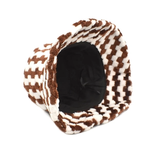Detail view of the plush checkered bucket hat showing thick faux fur texture and lining