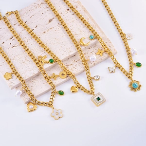 Bohemian gold layered necklace set with pearls, turquoise pendants, and heart flower charms