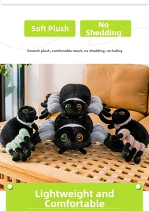 Detailed plush spider toys in various colors displayed on a modern wooden coffee table