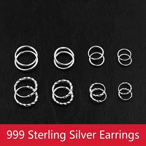 999 Sterling silver hoop earrings set with smooth and twisted rope design on black leather