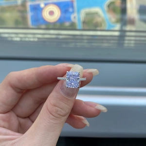 Macro shot of s925 silver ring featuring a radiant square cut light purple gemstone