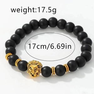 Herren Armband aus mattschwarzen Steinperlen mit goldenem Löwenkopf und 17cm Innenumfang