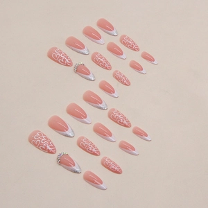 Minimalist white heart French tip almond press-on nails with silver glitter and rhinestones