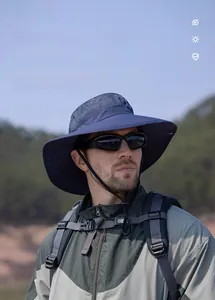 Detail of dark blue wide brim sun hat with breathable mesh and adjustable chin strap