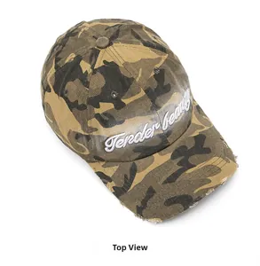 Top view of camouflage baseball cap with Tender beauty embroidery and distressed brim