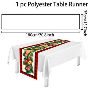 Detailed view of gingerbread man table runner with 180cm length and holly berry pattern