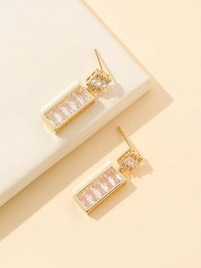 Elegant gold-tone rectangular dangle earrings with pave zircon crystals on white steps