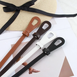 Slim leather belts for women in four colors with unique teardrop buckle for dresses