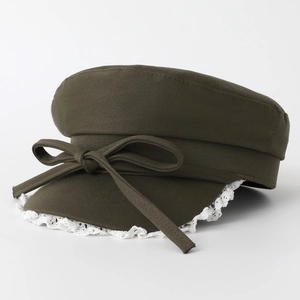 Olive green newsboy cap with bow tie and white floral lace edge on the brim for women