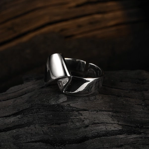 Minimalist S925 silver geometric C-shape twisted open ring on dark textured wood