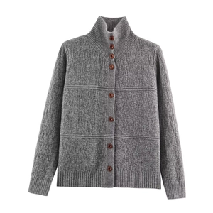 Women's grey high-collar knit cardigan with single-breasted brown buttons and textured weave