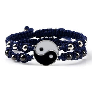 Matching Yin Yang Tai Chi braided bracelets in deep blue with magnetic charms for couples